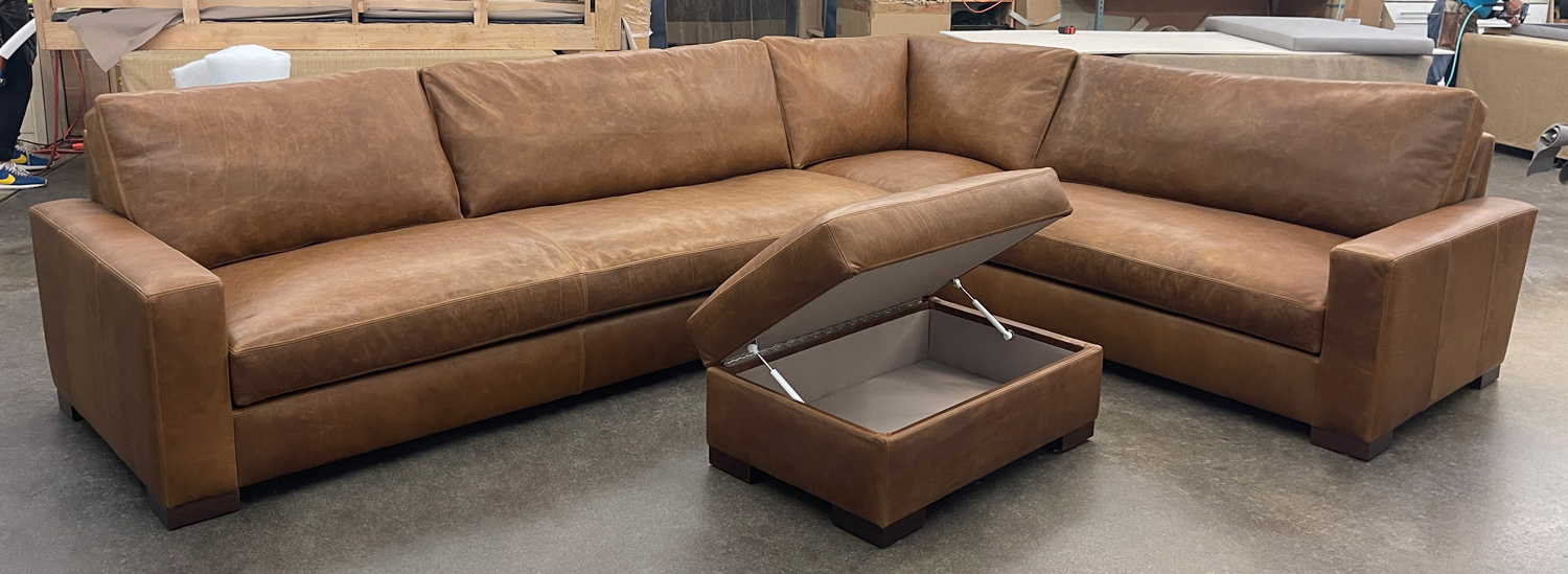 Custom Braxton L Sectional in Berkshire Tan Leather with matching Storage Ottoman - front view