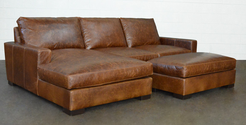 Left angle view of the Braxton Sofa Chaise Sectional with Cocktail Ottoman in Italian Brompton Classic leather
