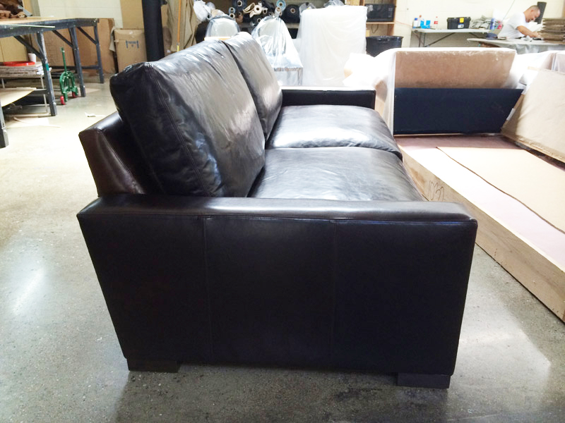 Side view of a 43 inch deep Braxton Twin Cushion Leather Sofa in Italian Brompton Cocoa