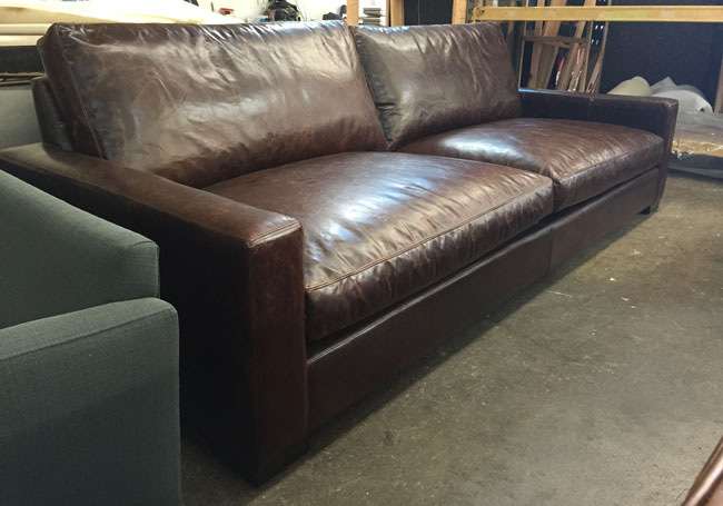 Accompanying these chairs is a 108" x 46" Braxton Twin Cushion Leather Sofa in Italian Brompton Cocoa leather